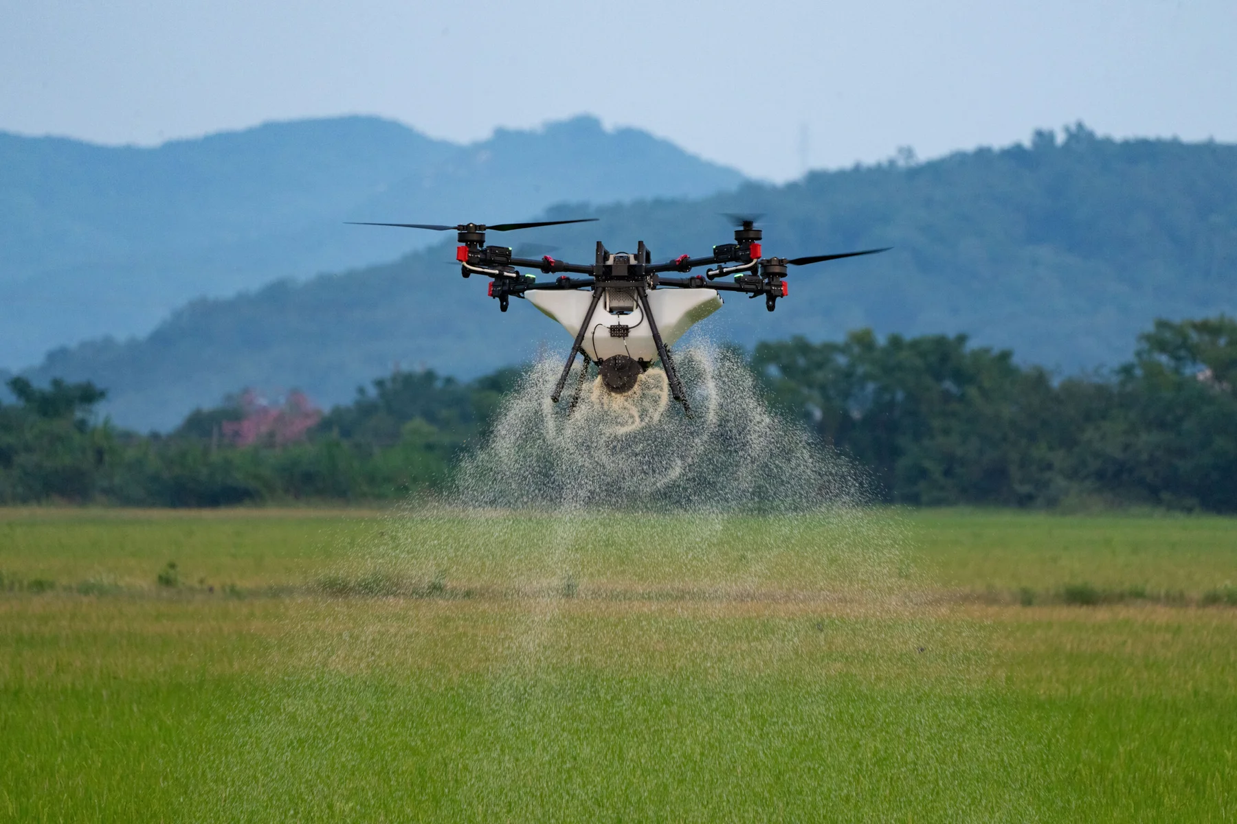 XAG P150 operating with its granular spreading system