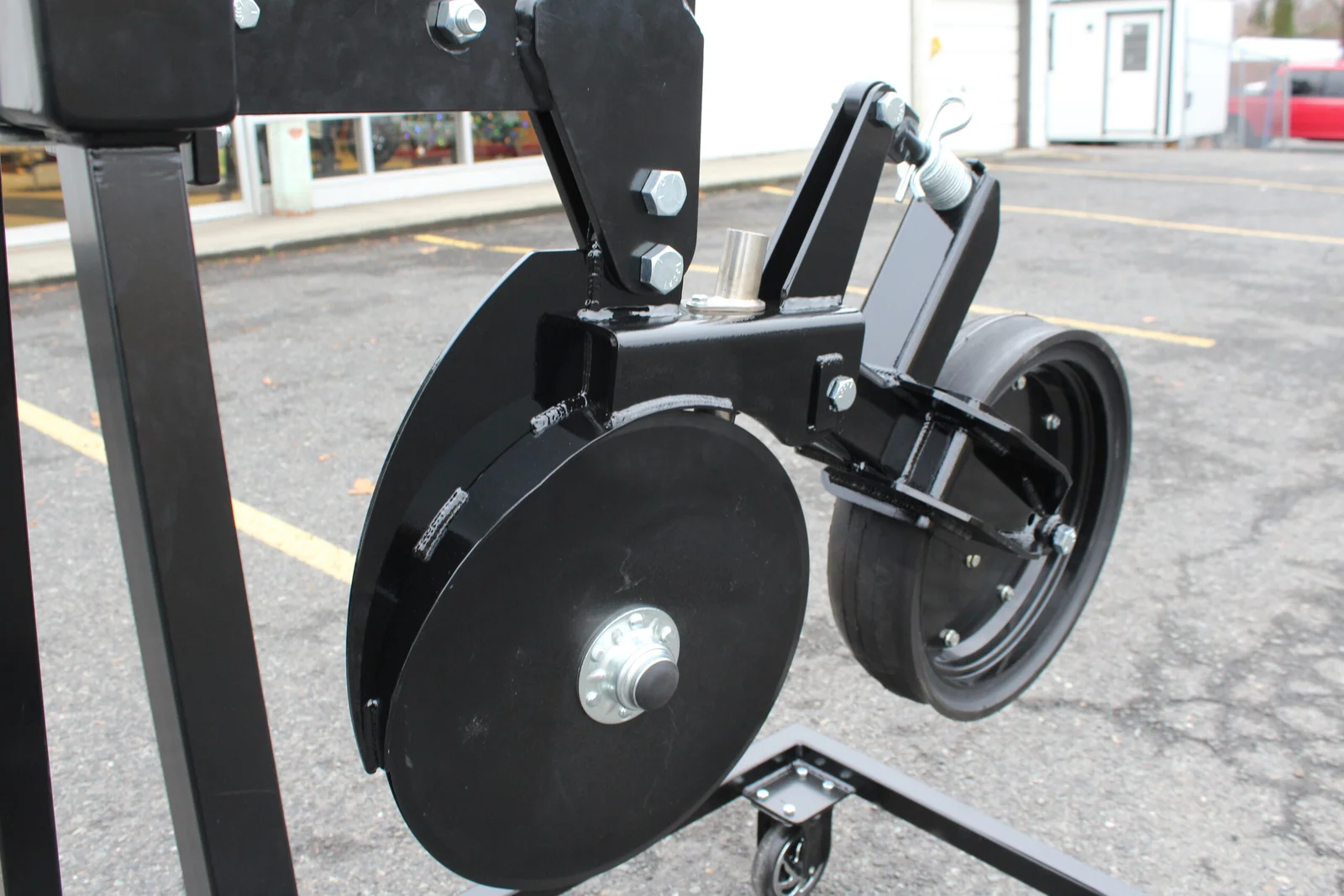 AGPRO double disc opener prototype with two discs and a rear press wheel