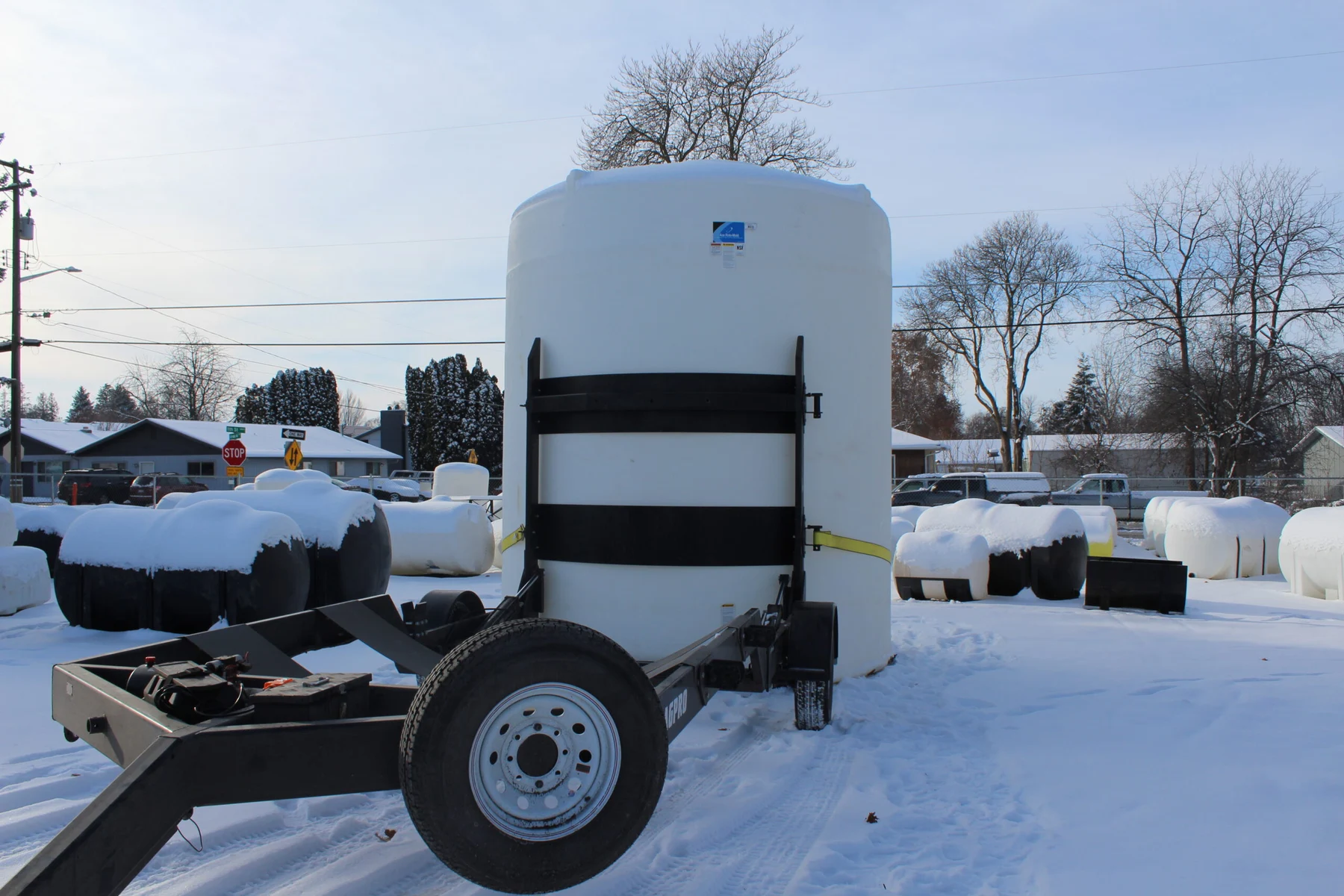 AGPRO tilt trailer with a free-standing tank in the upright position AGPRO tilt trailer with a free-standing tank in the upright position